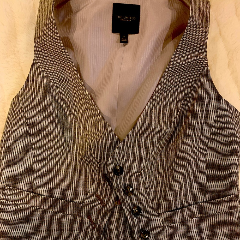 Adorable gray vest.